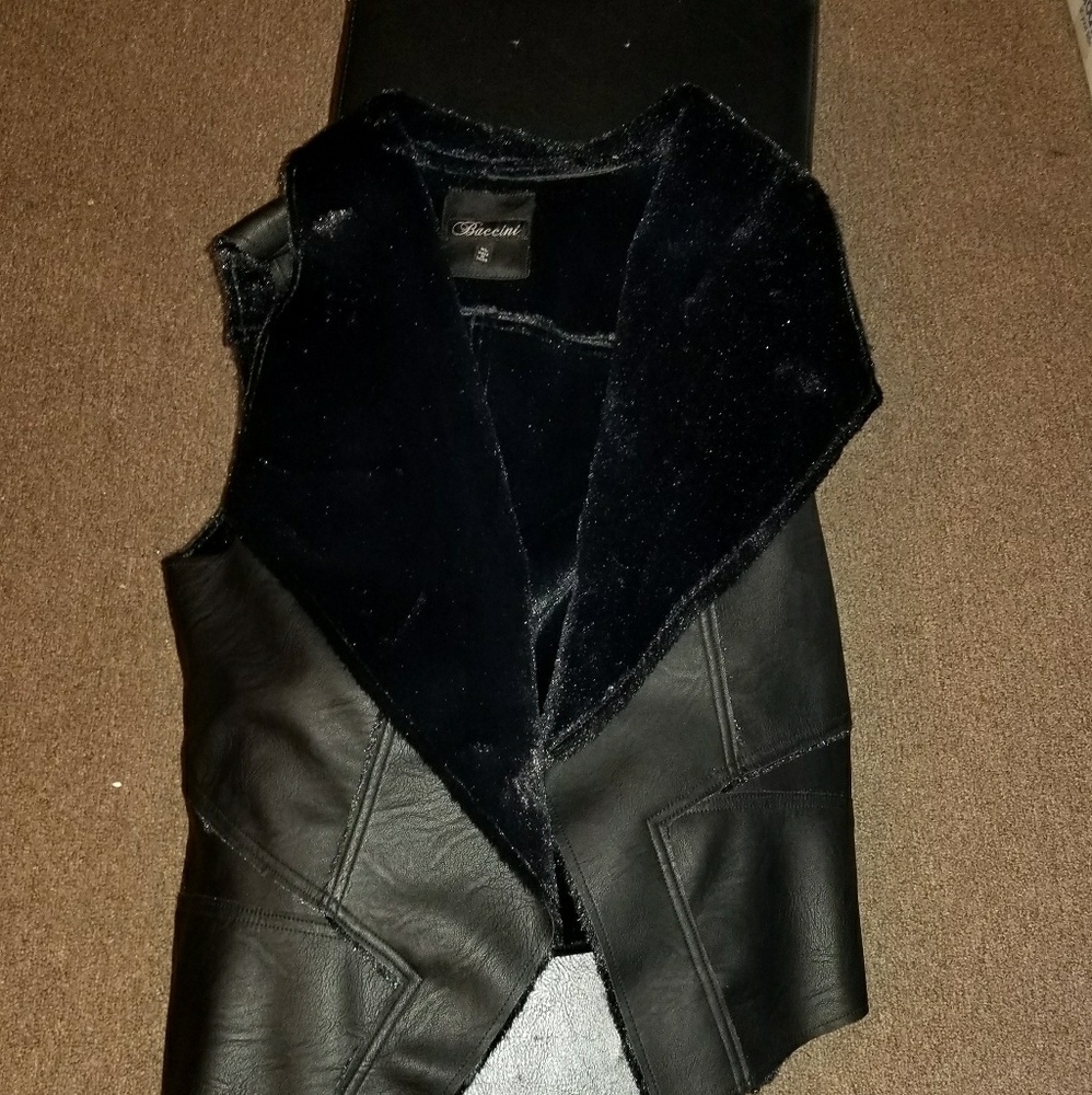 Cute faux leather vest with fur trim